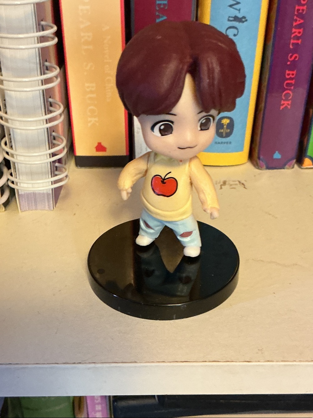 Suga figurine with stand